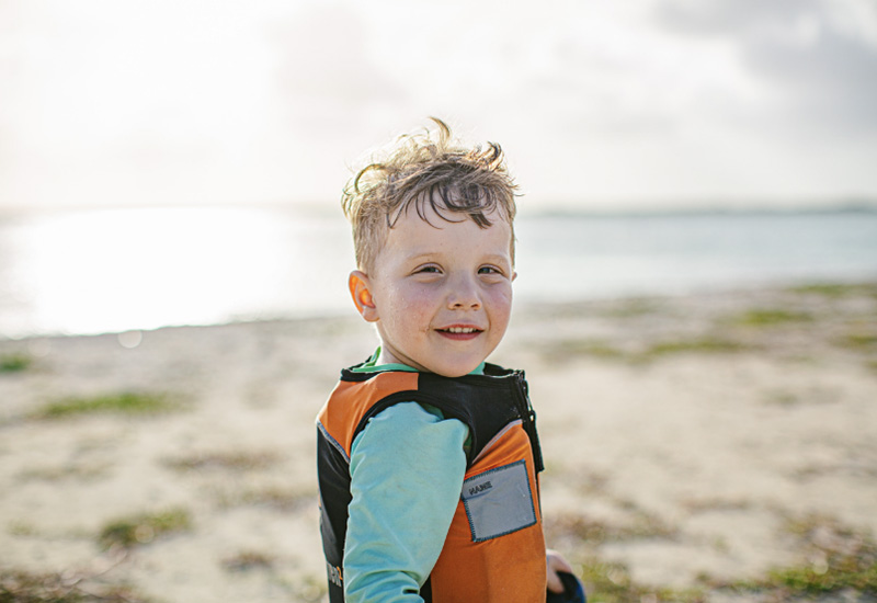 Young kid in a lifejacket