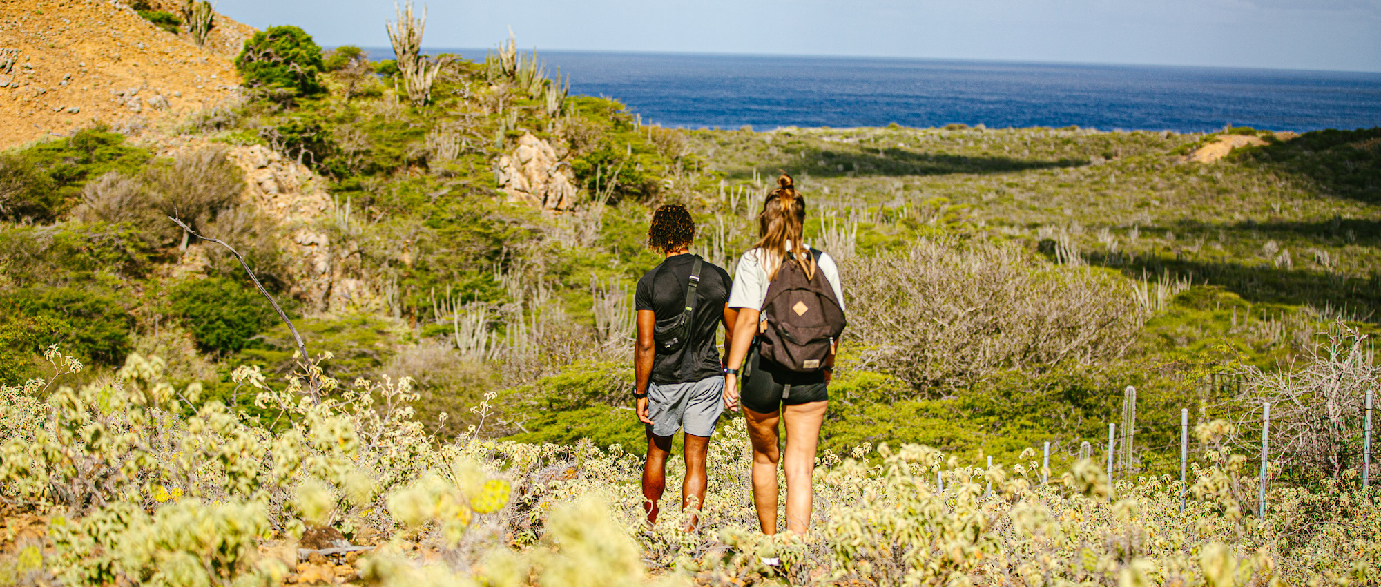 Male and woman hiking