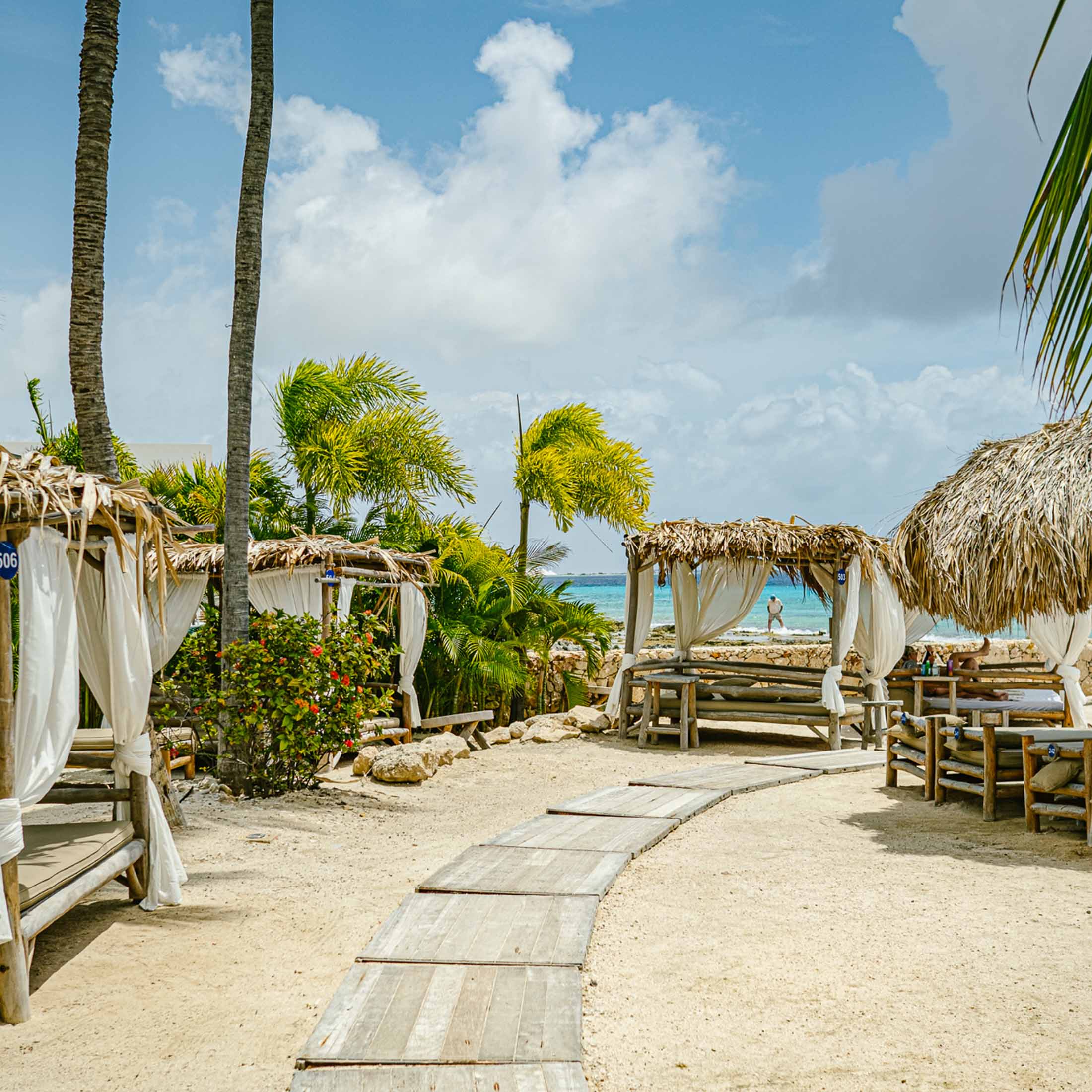 Hotel cabanas alongside beach