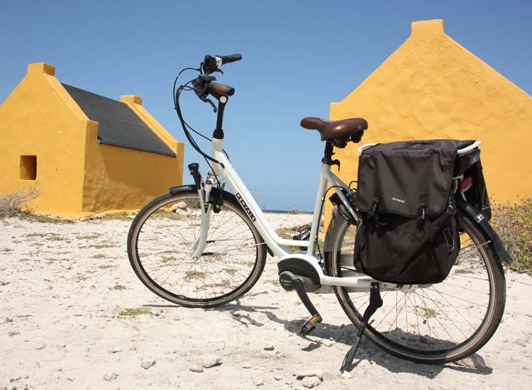 Bike in front of slave huts