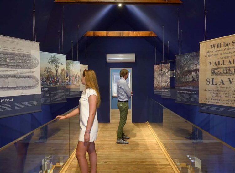 Two people exploring a museum